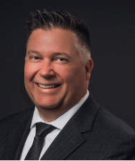 picture of Patrick in a black Suit